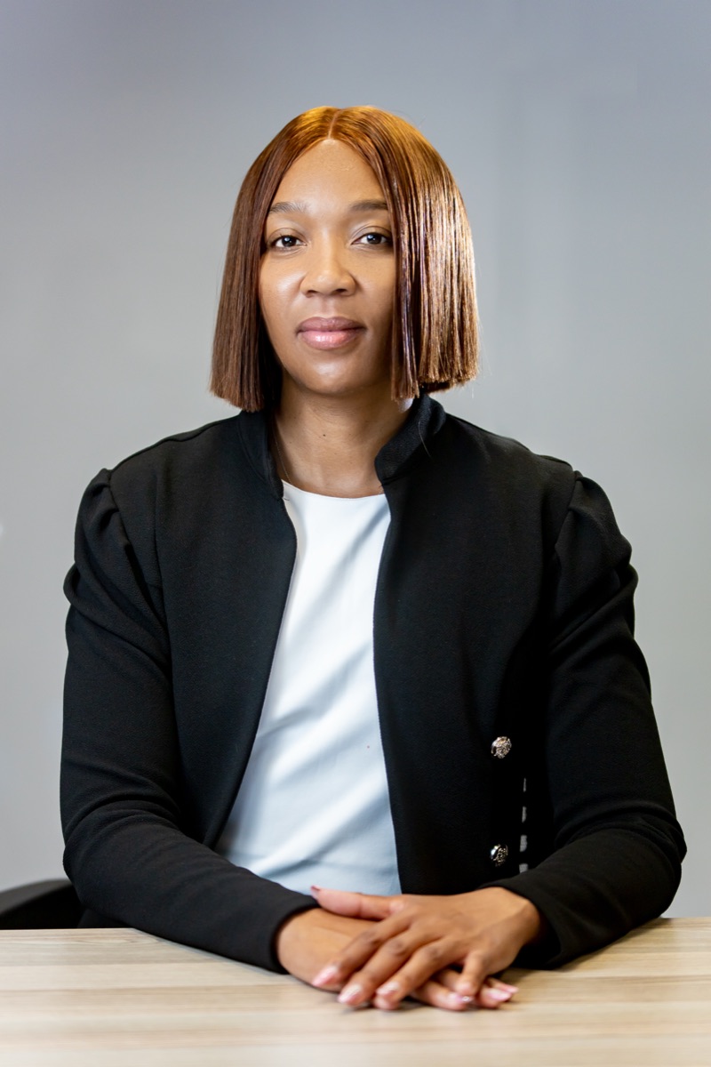 Lesego Gaegane seated in a black blazer